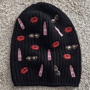 Carolyn Rowan black knitted wool beanie with embroidery